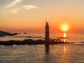 Dawn over St Malo Lighthouse in September Dawn over St Malo