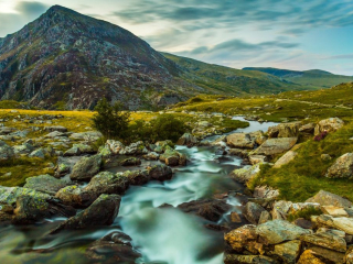Pen yr Ole Wen and mountain stream in Snowdonia National Park Wales